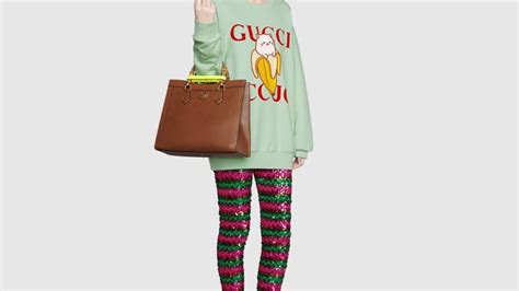 gucci anime girl holding 100 bills|gucci bananya launch collection.